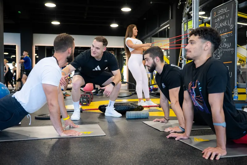 Participants practising floor exercises during a hands-on HFS training session